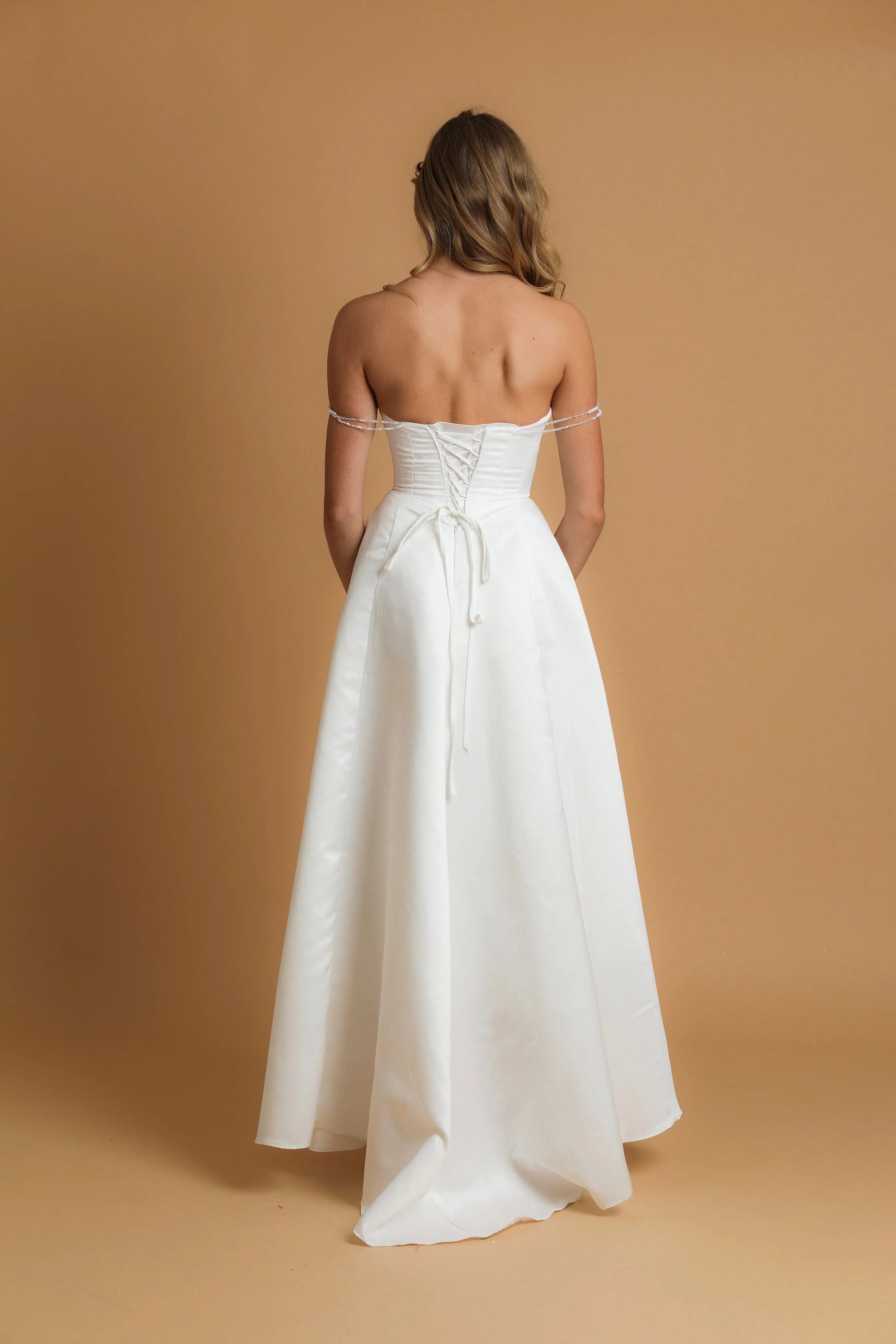 white dress with cut out neckline detail for hire